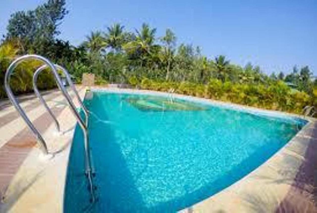 Coorg Nesara Hotel And Resort Kushālnagar Exterior photo